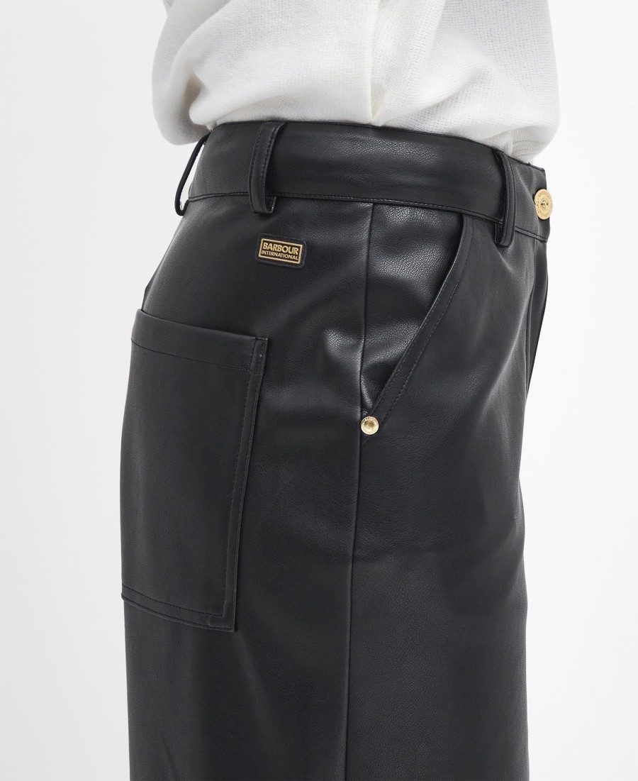 calça aria de couro sintético com pernas largas